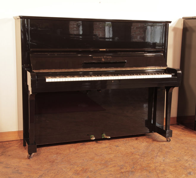 Reconditioned, 1939, Steinway Model V  upright piano for sale with a black case and brass fittings. Piano has an eighty-eight note keyboard and two pedals